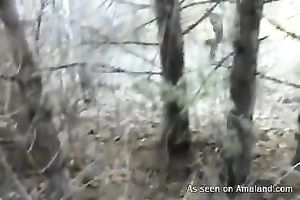 Brown-haired hussy sucks a wang outdoors and enjoys it from behind