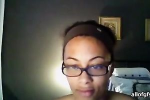 Ebony horny white wife in glasses exposes her body for the webcam