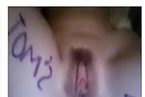 Nerdy dark brown girl pleases her own quim on webcam