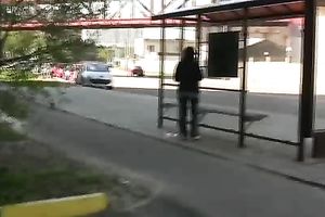 Brunette skank pees in her jeans at a busstop and enjoys herself