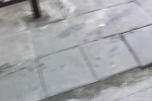 Brunette skank pees in her jeans at a busstop and enjoys herself