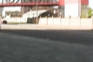 Brunette skank pees in her jeans at a busstop and enjoys herself