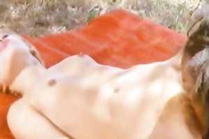 Ebony chick and slender European slutty wife having lesbo enjoyment outdoors