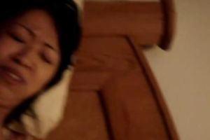 Asian milf groans loudly while getting her love tunnel toyed