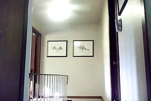 Horny slender white chick gets undressed on camera in the corridor