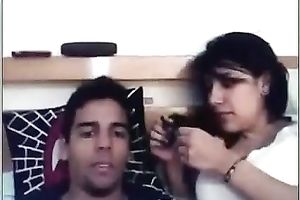 Pretty non-professional honey lets her BF take up with the tongue her scones in front of a web camera