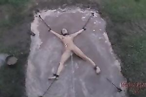 Bound floozy Dia enjoys dirty procedures in the yard