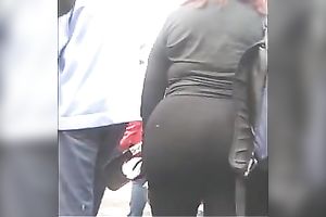 Huge-assed redhead slutwife acquires caught on a hidden livecam in the streeet