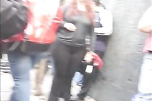 Huge-assed redhead slutwife acquires caught on a hidden livecam in the streeet