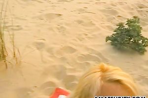 Amateur golden-haired girlfriend sucks and bonks on the beach