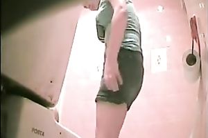 Two skinny girls receive caught on a hidden livecam in a shitter