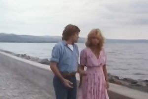 Hot golden-haired beauty kisses a impressive chap on the boat