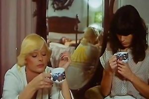 Retro blond housewife receives her boobs massaged by her maid