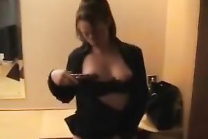 My wicked co-worker wearing nylons toys her slit in an office