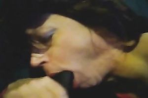 This mother I'd like to fuck is engulfing my large dark wang like a true doxy