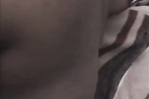 Curly haired Indian skank is showing off her natural tits