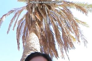 Lusty dark brown dish sucks hard penis with joy on the beach