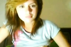 Playful legal age teenager with red hair exposes her wazoo and her cunny on web camera