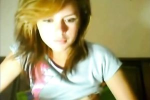 Playful legal age teenager with red hair exposes her wazoo and her cunny on web camera