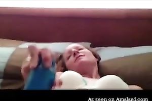 Nasty redhead honey drills her fur pie with a blue sex toy