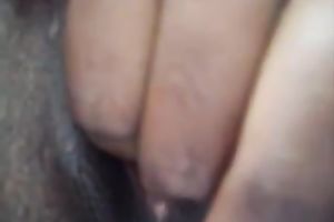 Black juvenile floozy widens her legs and demonstrates brown muffin