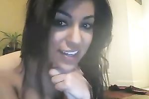 Mesmerizing breasty dark brown on the floor masturbates in front of web camera