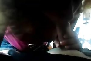 Curly-haired cutie engulfing and rubbing my rod indoors