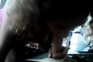 Curly-haired cutie engulfing and rubbing my rod indoors