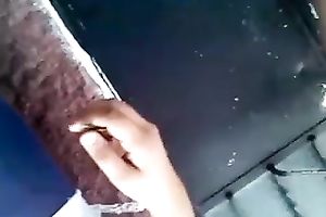My friend, wearing constricted legging, lets me film her in the street