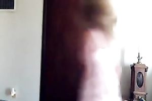 Sweet looking webcam model in pink costume puts on a precious show