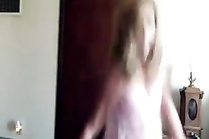 Sweet looking webcam model in pink costume puts on a precious show