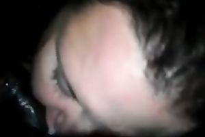 Curly haired slut knows how to give worthy head in front of a camera