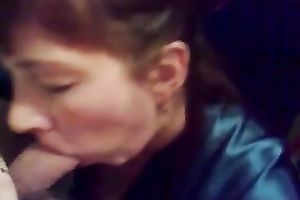 Brunette milf doesn't look at me whilst engulfing my prick