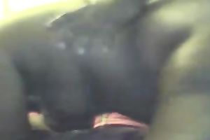 Fucking a salacious dark BBW's muff from behind indoors