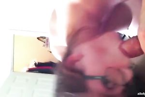 Nerdy sexpot in glasses shakes her big mangos whilst blowing large schlong