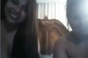 Two hawt Indian babes expose their undressed melons and kiss on livecam