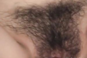 Horny Asian dude tickles her pussy with a vibrating egg