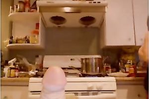 Curvaceous redhead with large bazookas shows off her large booty