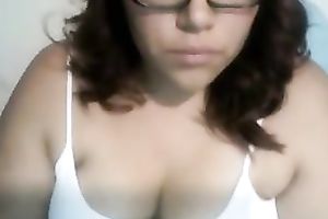 Hot curvy dark brown wife flashes her large boobies on cam