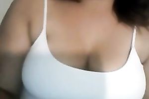 Hot curvy dark brown wife flashes her large boobies on cam