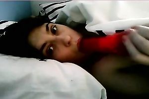 Horny brunette hair lalin girl blows a marital-device during the time that I see her on livecam