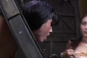 Raven haired whore with tattooed body sucks her mistress's boob