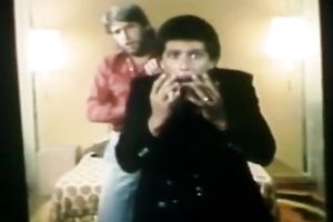 Busty blonde seductress is talking on a phone