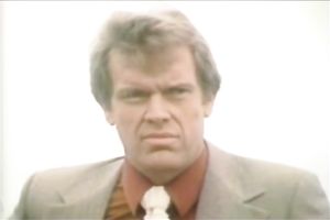 Busty blonde seductress is talking on a phone