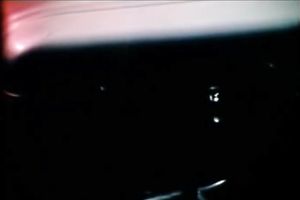 Busty blonde seductress is talking on a phone