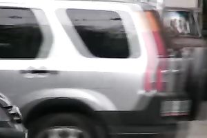 Skinny Russian golden-haired girl walks on the sidewalk and pisses