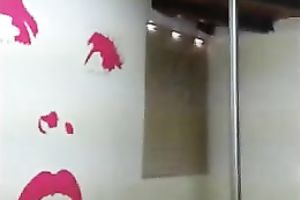 Sexy dark brown sucks a fake penis in advance of pushing it in her hairless cooch