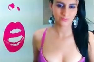 Sexy dark brown sucks a fake penis in advance of pushing it in her hairless cooch