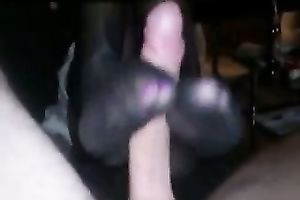 Skillful wench in hawt hose is giving me a good footjob