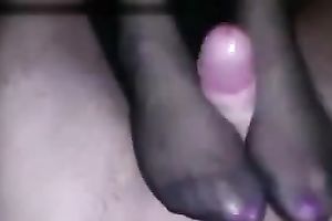 Skillful wench in hawt hose is giving me a good footjob